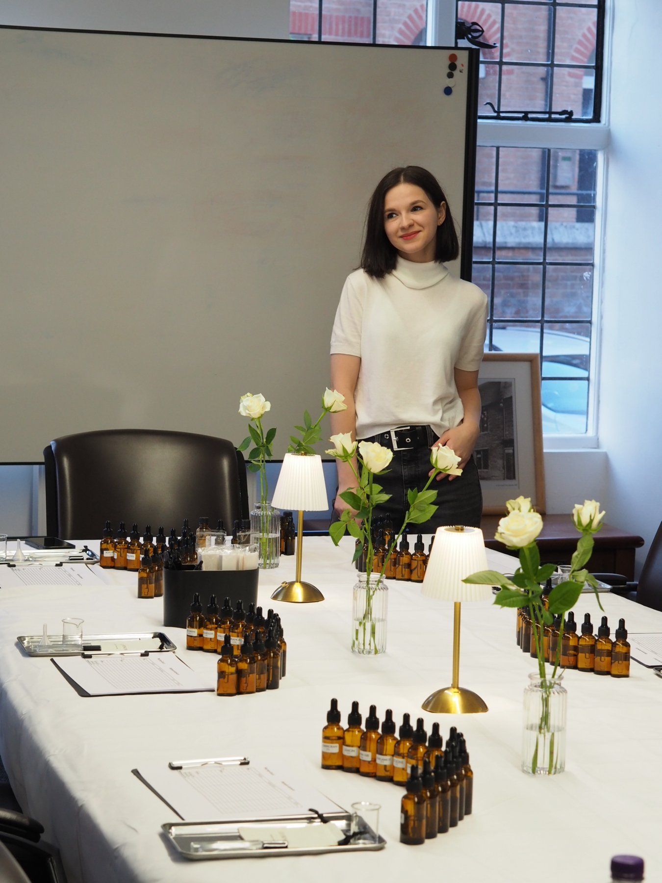 The OZORNINA perfumer welcoming guests to a perfume workshop