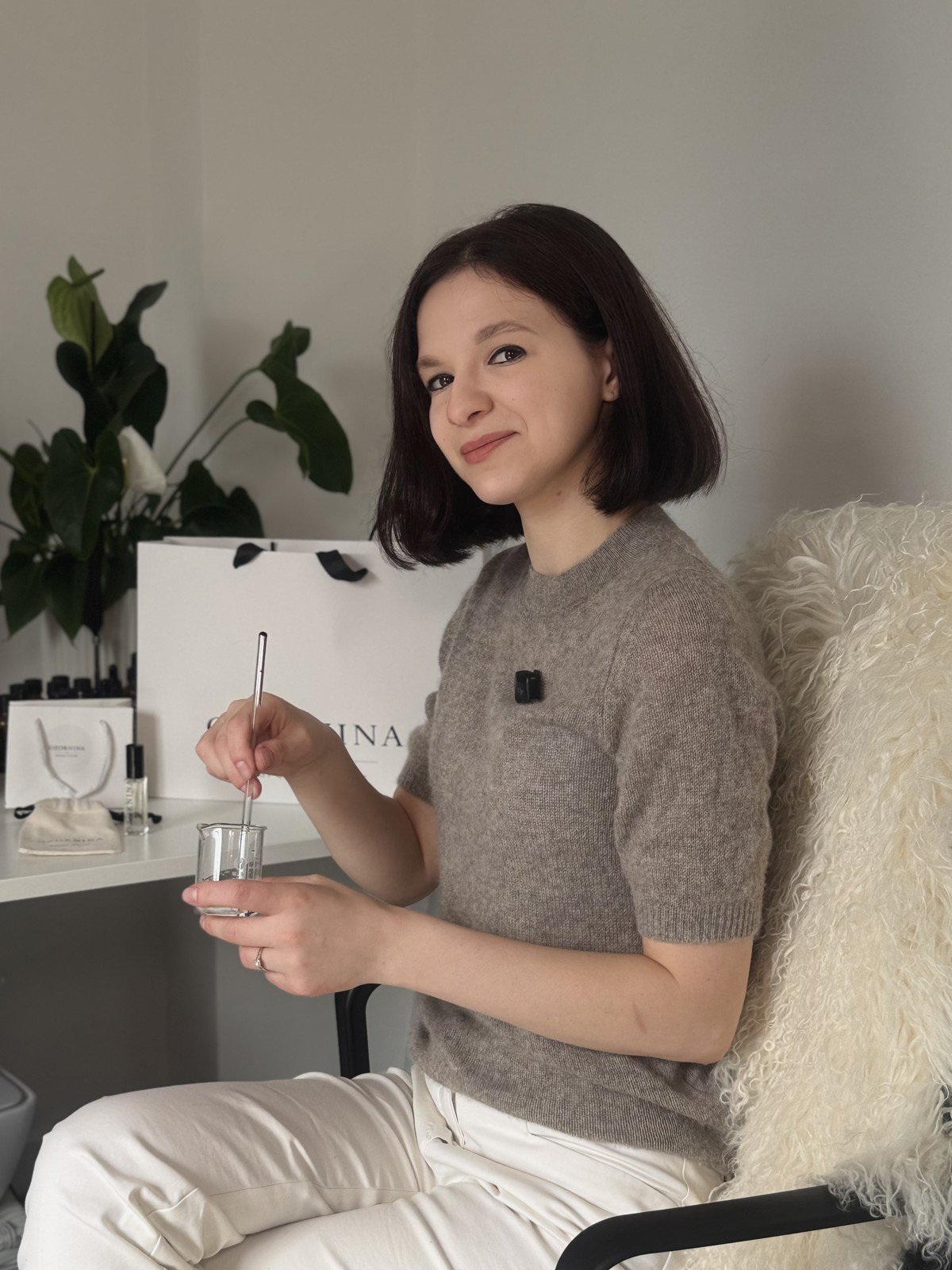 OZORNINA perfumer hand-blending a fragrance in the atelier
